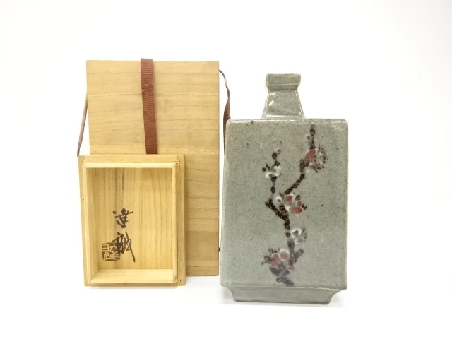 Jar with plum blossoms painted by the artist