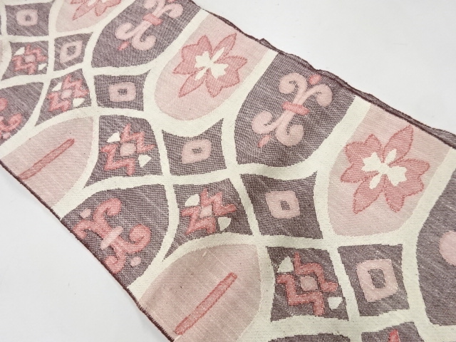 アンティーク　手織り真綿紬花に抽象模様織出し名古屋帯